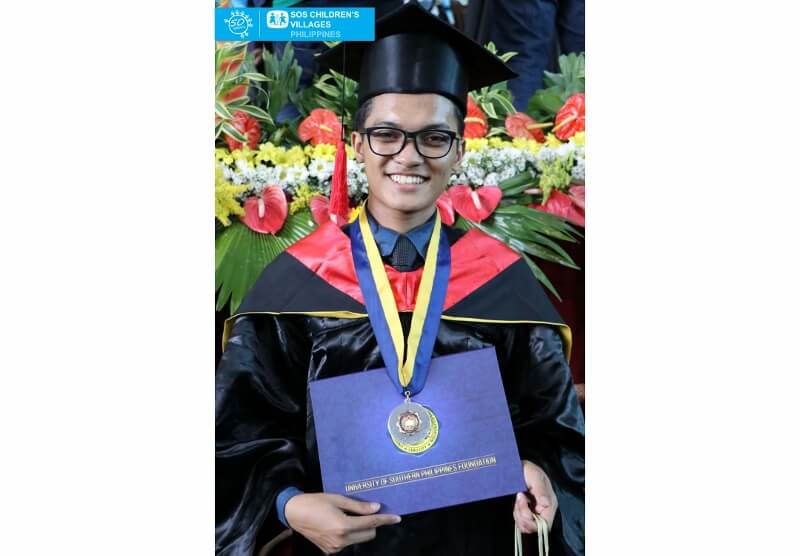 SOS youth graduates magna cum laude from University of Southern Philippines Foundation SOS